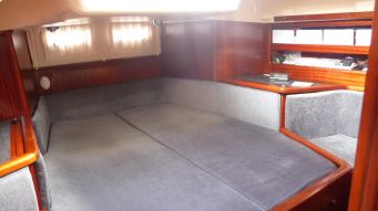 Our well-appointed aft stateroom, with a surprising amount of shelves, drawers, lockers and storage areas, not to mention a TV